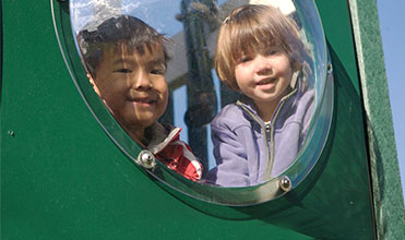 children on playset enjoying outdoor games children on playset enjoying outdoor games