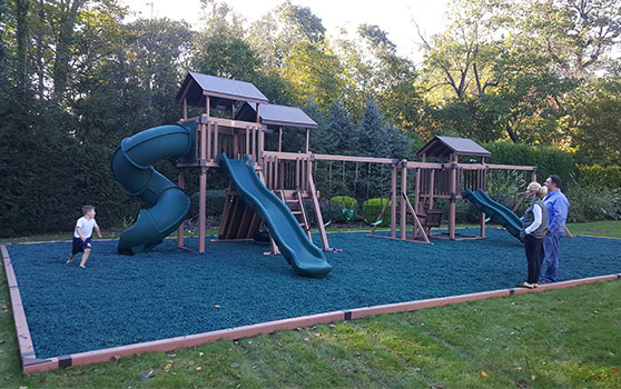 custom playset with rubber mulch and vinyl curbing custom backyard playset