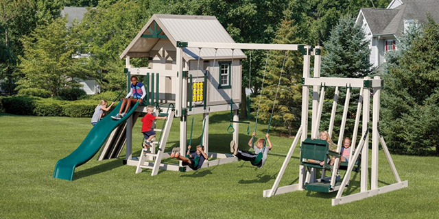 swing set with playhouse used for imagination games happy hideout playhouse