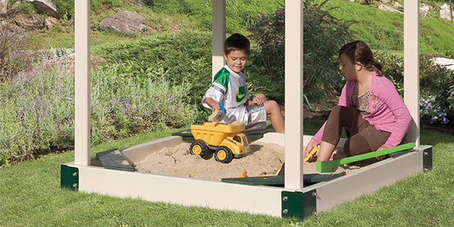 kids playing in sandbox next to outdoor play set sandbox next to outdoor play set