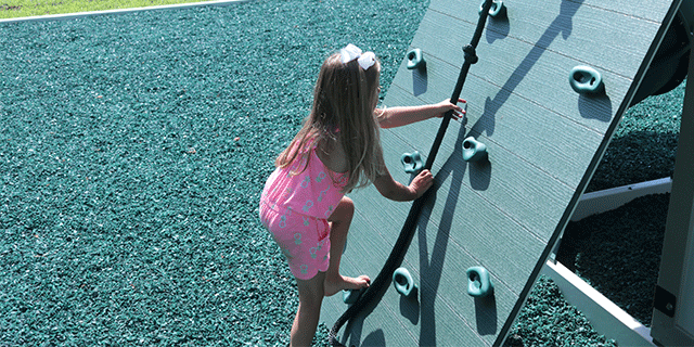 swing set with a rock wall add on for kids climbing up to tower rock wall swing set add on