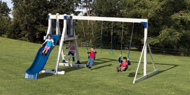 outdoor playset for toddlers with 2 swings, trapeze rings, a small tower, and a matching slide frolic zone outdoor playset for toddlers