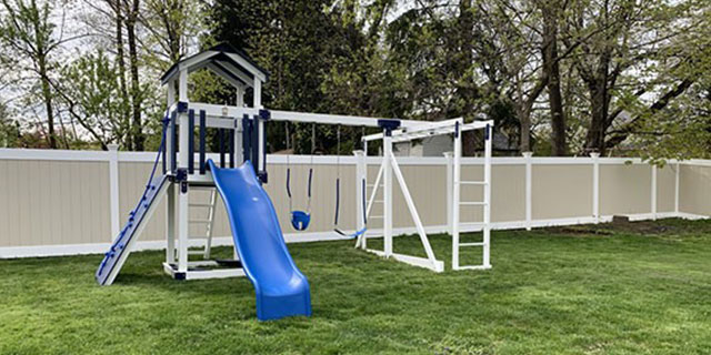 custom space-saving playset featuring overhead climbers custom space-saving playset