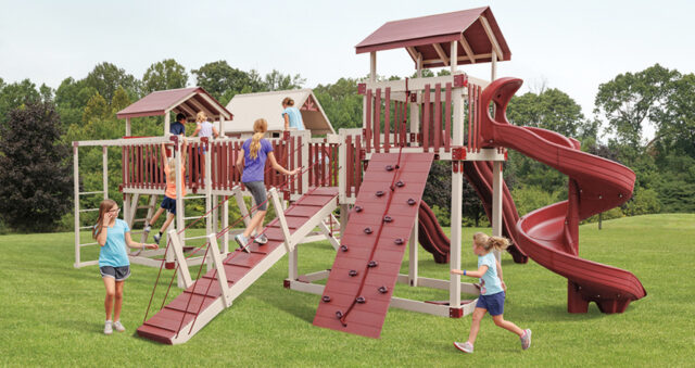 kids playing on playsets with monkey bar